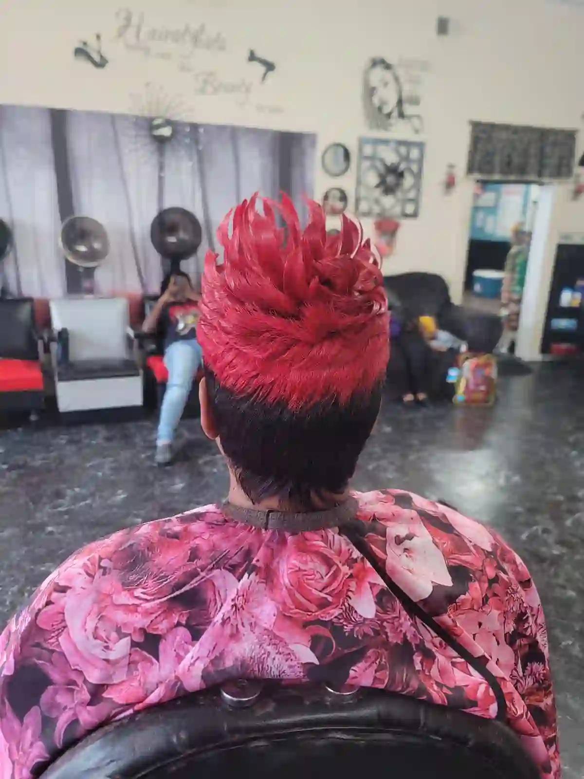 Red hairstyle created at Mo'Hair Beauty Salon